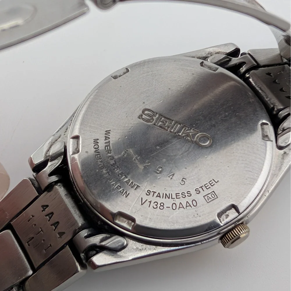 Seiko Solar V138-0AA0 Blue Sunburst Day/Date Two Tone Women's 25mm Watch